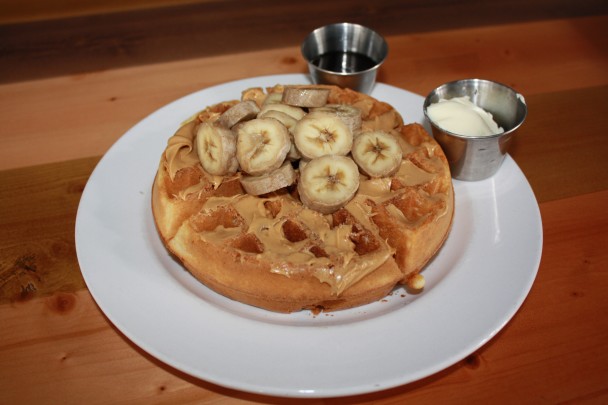 Belgian Waffle: Choice of Granny Smith Apples with Caramel, fresh Strawberries with Whip Cream, Peanut Butter, Banana and Honey