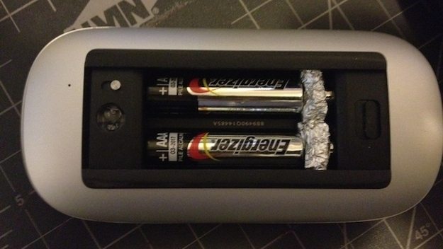 Make AAA batteries into AA with tinfoil. (We've never tried this).